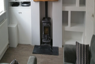 Bespoke cupboard and alcove shelving in white